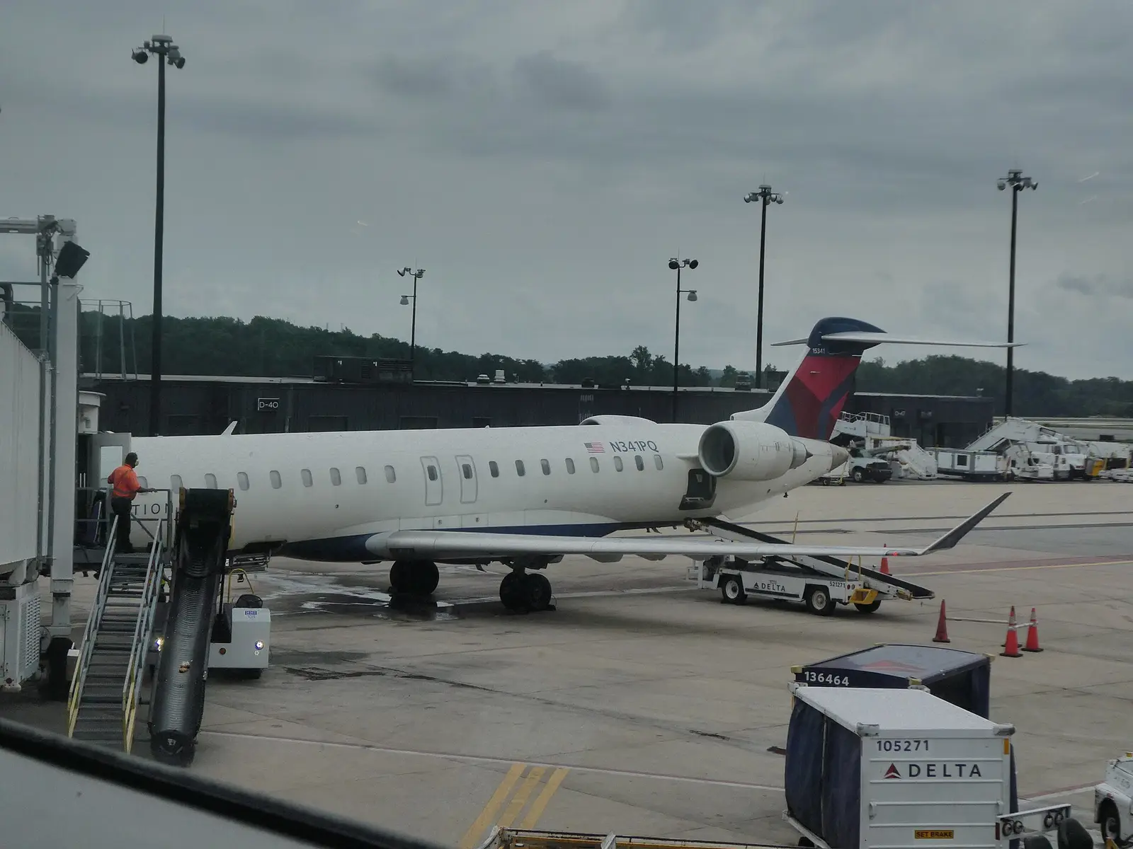 A Delta regional jet at a gate at Baltimore/Washington International Airport