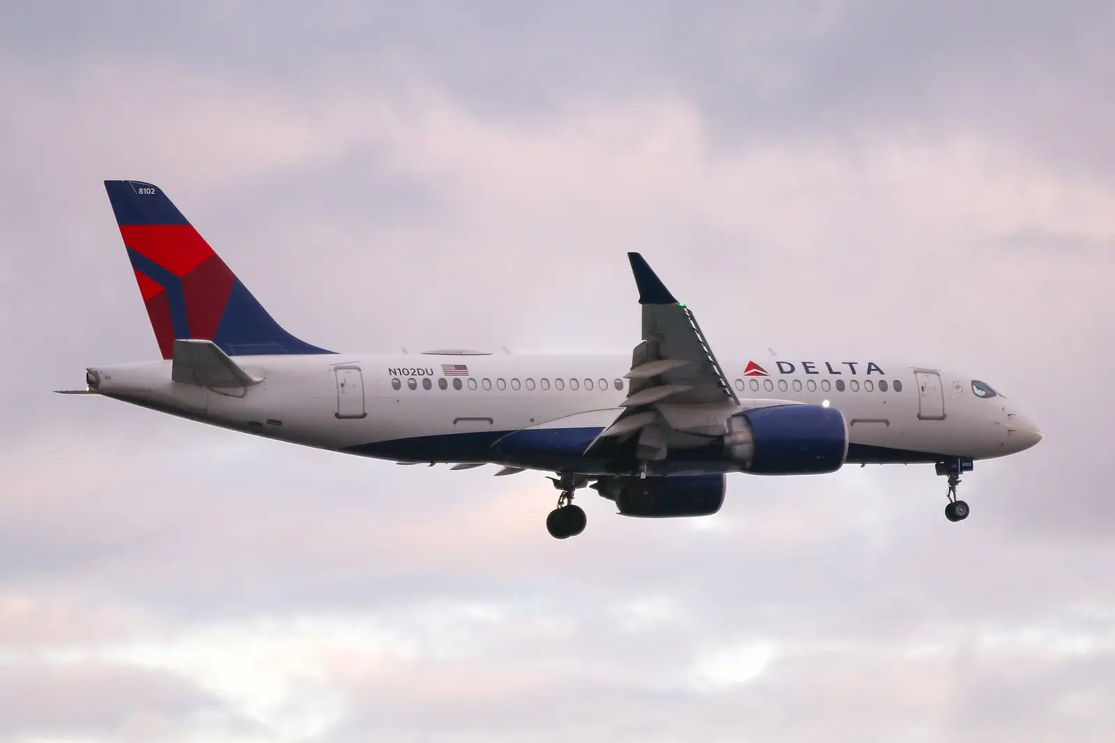 A Delta Air Lines Airbus A220 on final approach