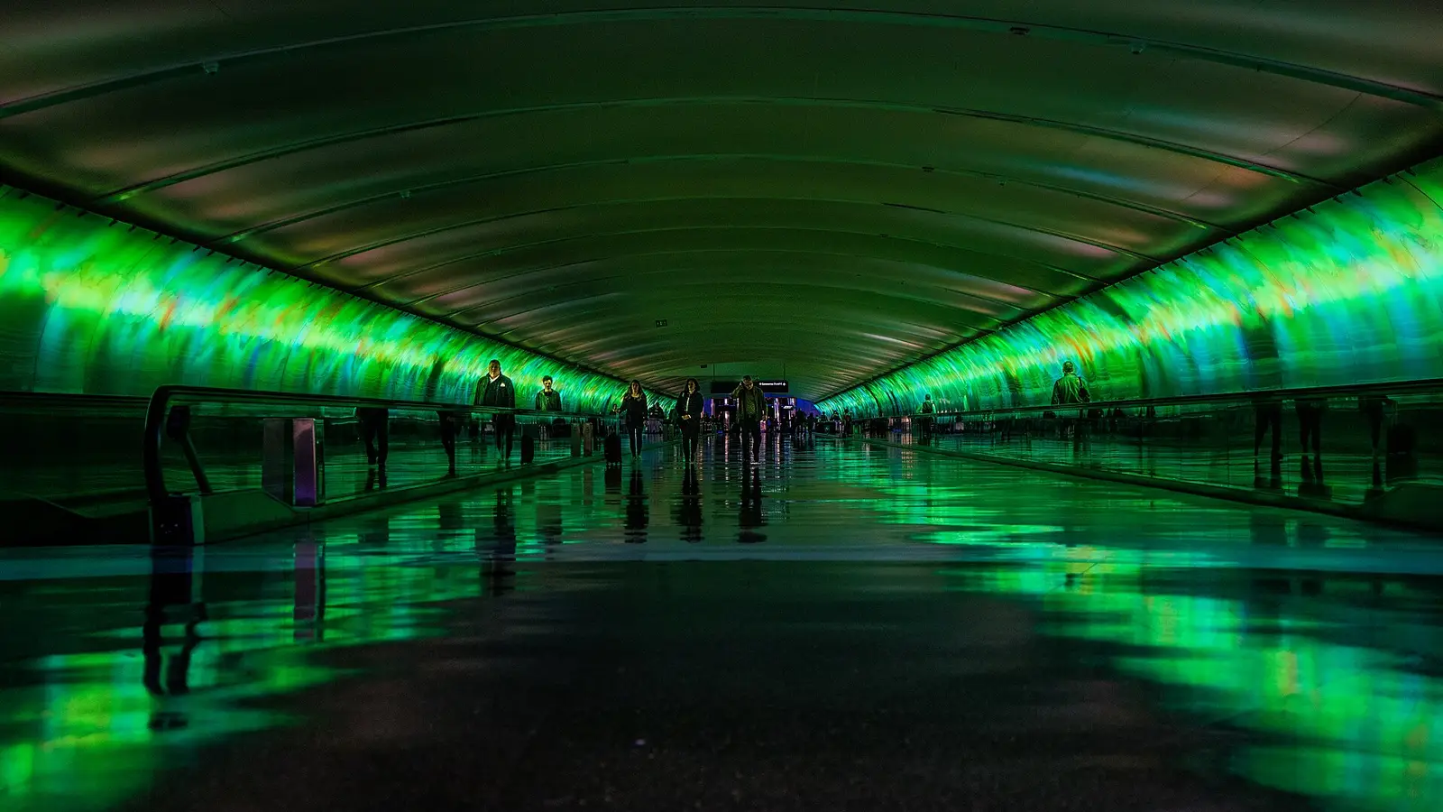 The lit pedestrian tunnel between concourses at Detroit Metropolitan Airport
