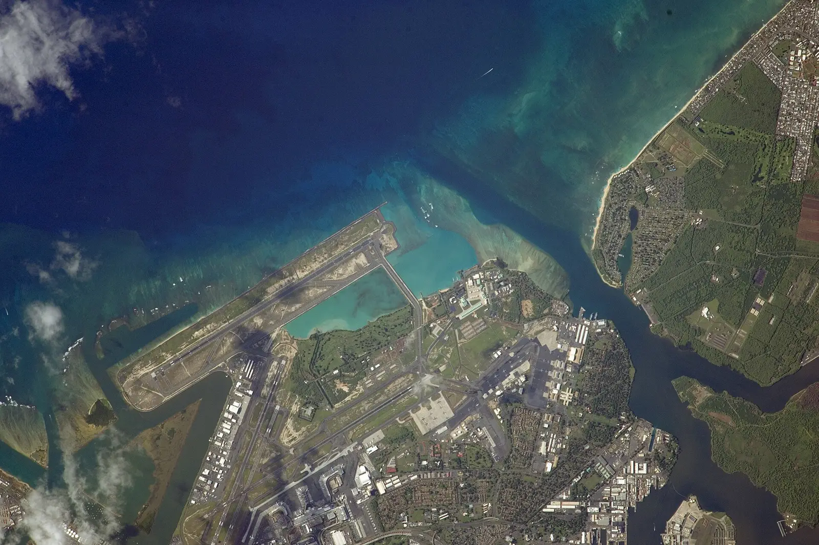 Honolulu International Airport and the reef runway photographed from the International Space Station