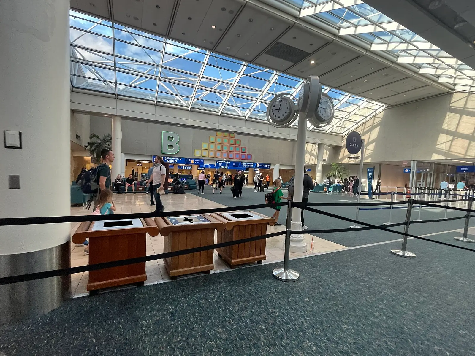 The glass-roofed atrium of Terminal B at Orlando International Airport