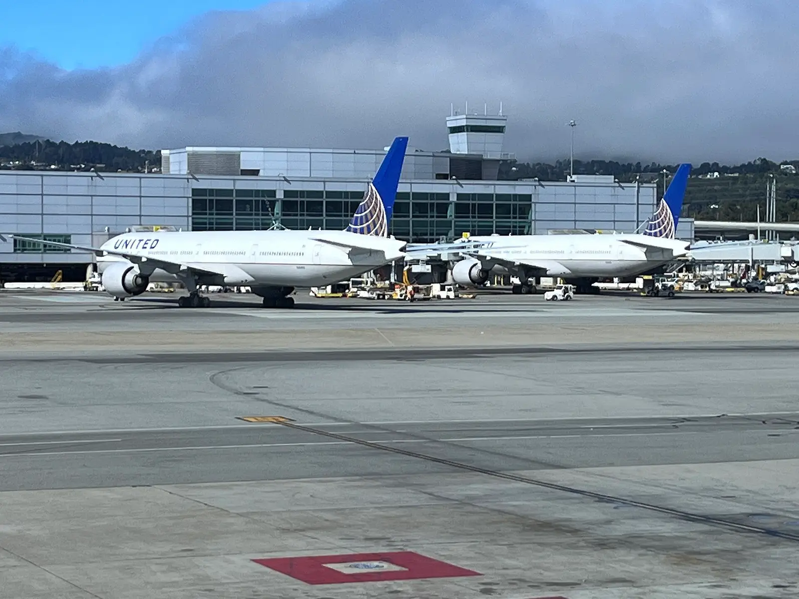 Aircraft at the gates of San Francisco International Airport on a summer day