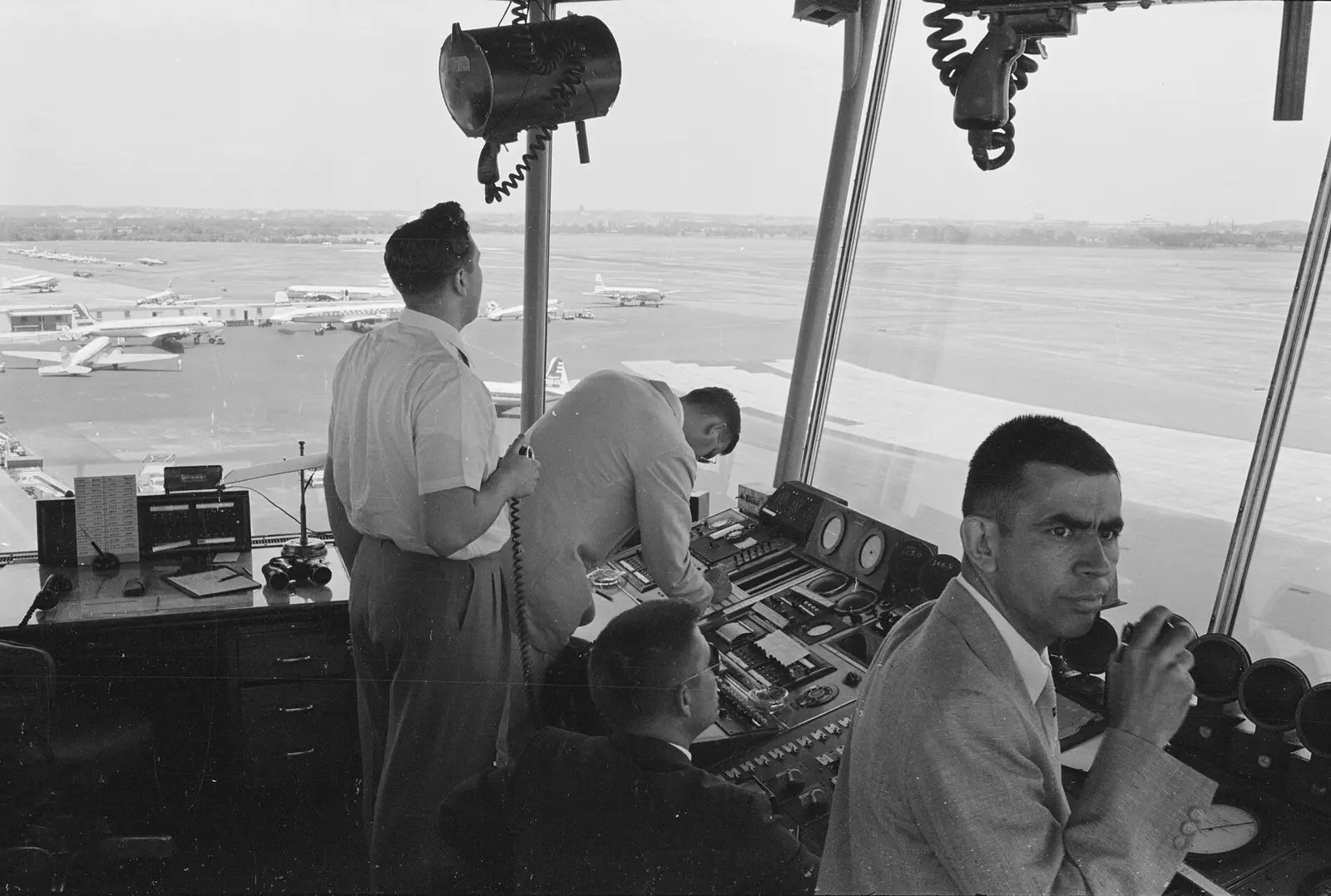 Air traffic controllers at work in the control tower at Washington National Airport in 1958